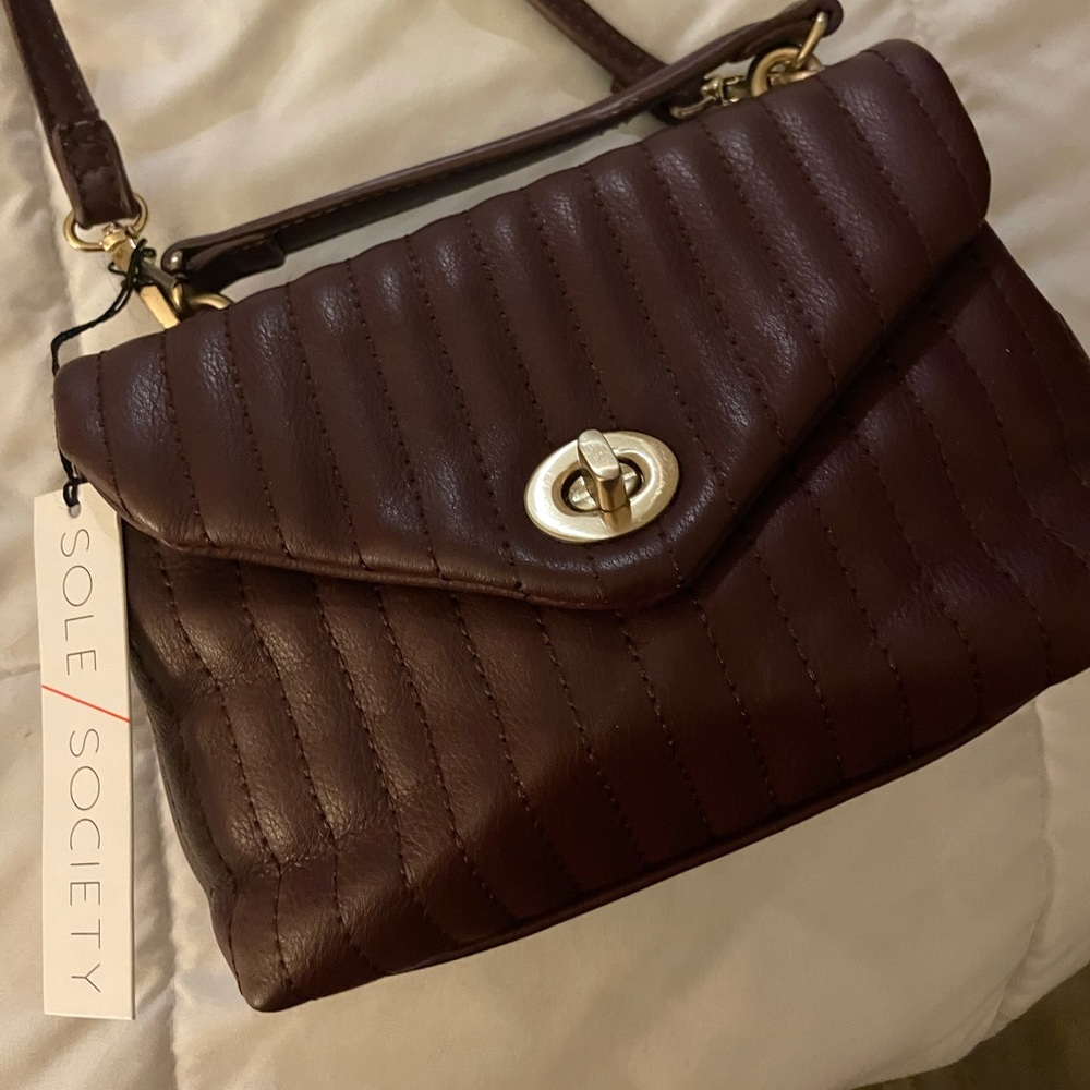 Sole society over the shoulder bag